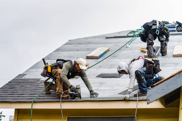 Professional Roof Installation technician working in Breezy Point, NY
